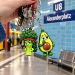 Broccoli Mullet & Anxious Avocado Keychain Duo worn or in use