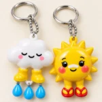 Cloud in Wellies & Sunburnt Sun Keychain Duo close up