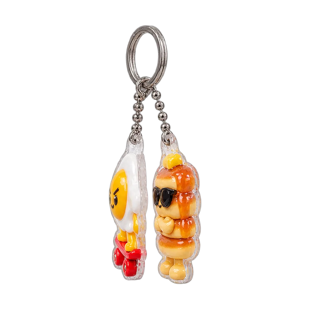 Egg Skater & Pancake Tower Keychain Duo, back or side view