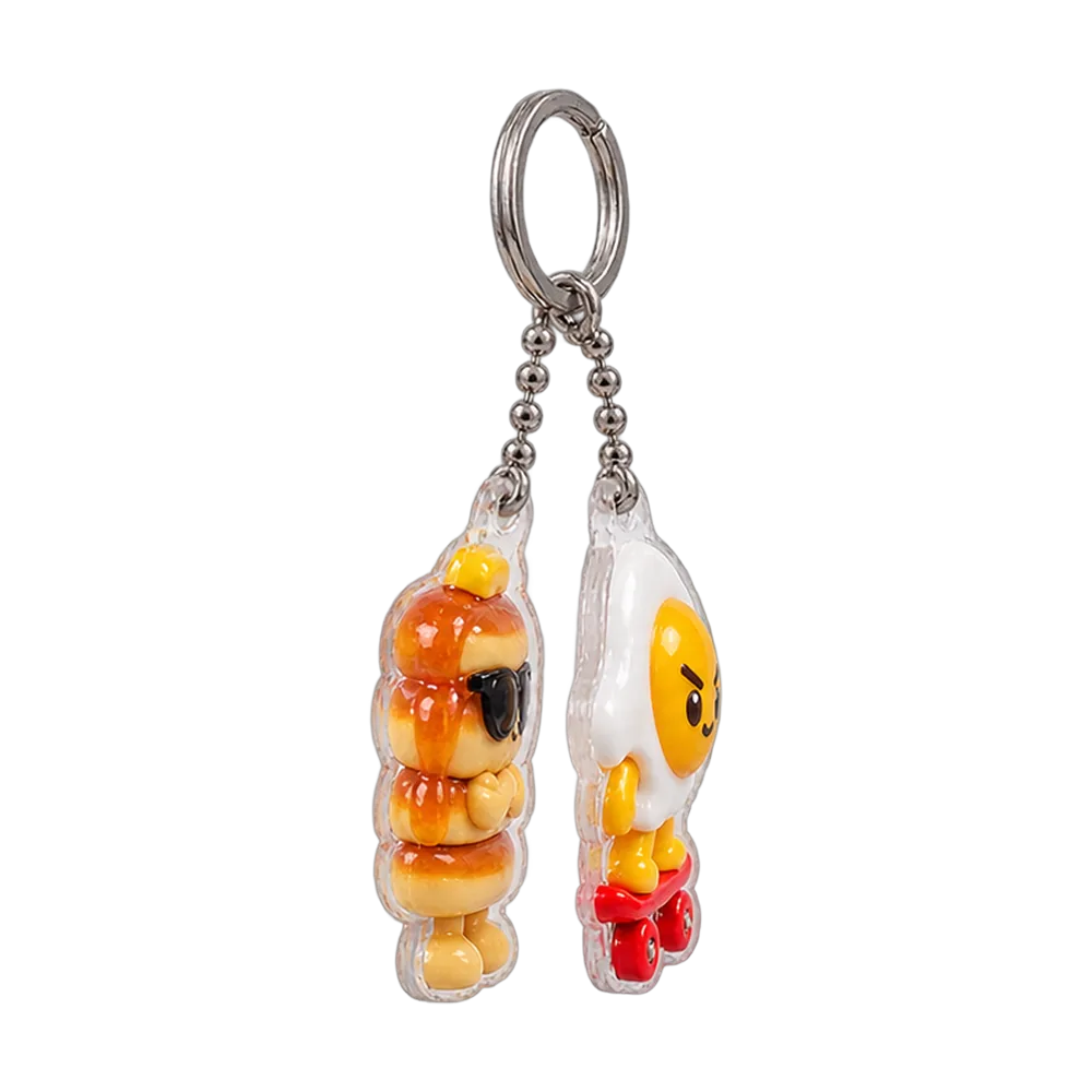 Egg Skater & Pancake Tower Keychain Duo, back or side view