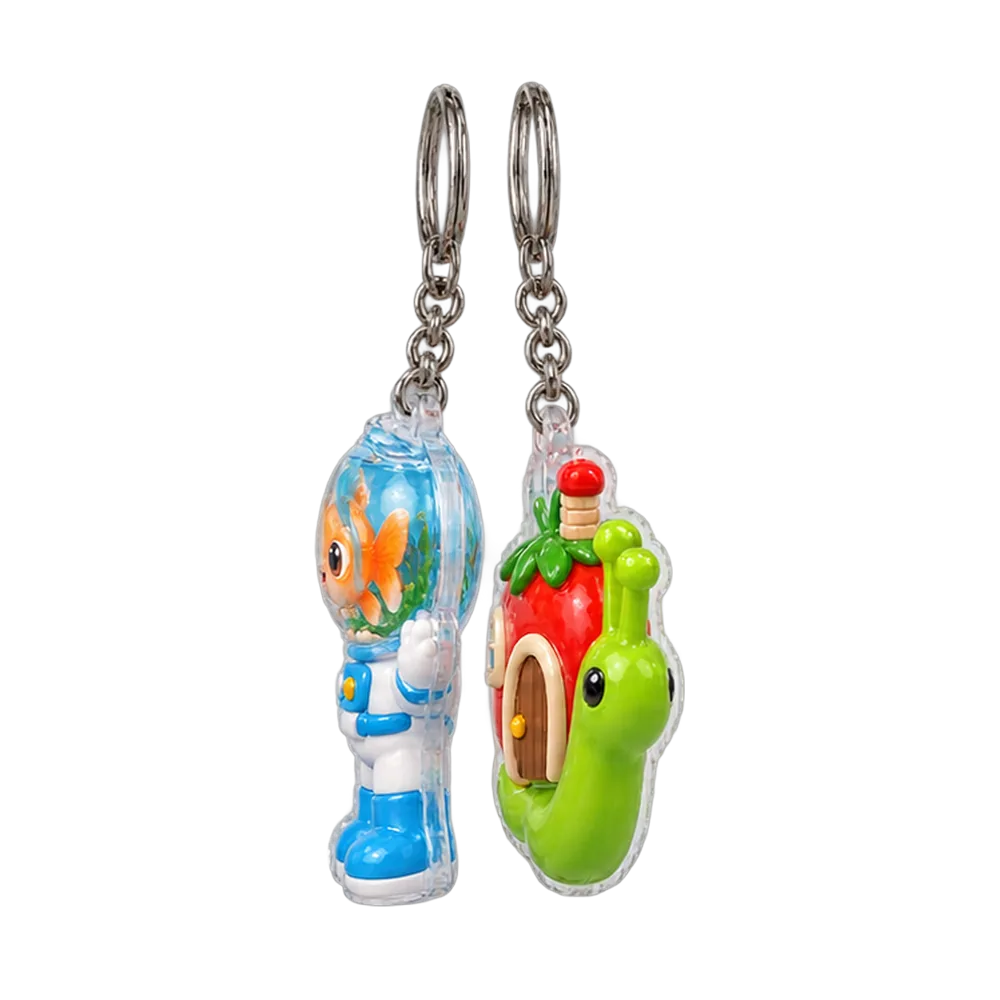 Goldfish Astronaut & Snail Mover Keychain Duo, back or side view