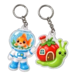 Goldfish Astronaut & Snail Mover Keychain Duo, front view