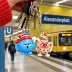 Sleepy Kettle & Teapot Tantrum Keychain Duo worn or in use